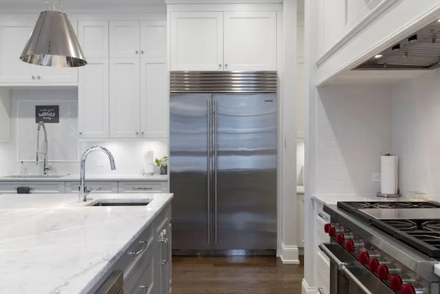 Kitchen with stainless steel appliances in a coastal rental property